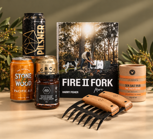 Collection of items including beer cans, a book, and meat claws on a white background