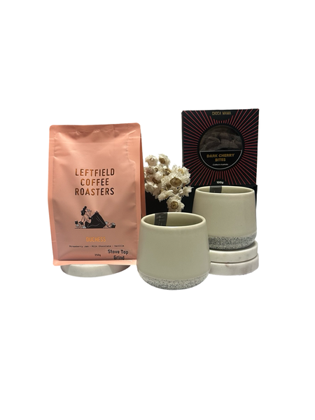 Leftfield Coffee Roasters package with two ceramic planters on a white background