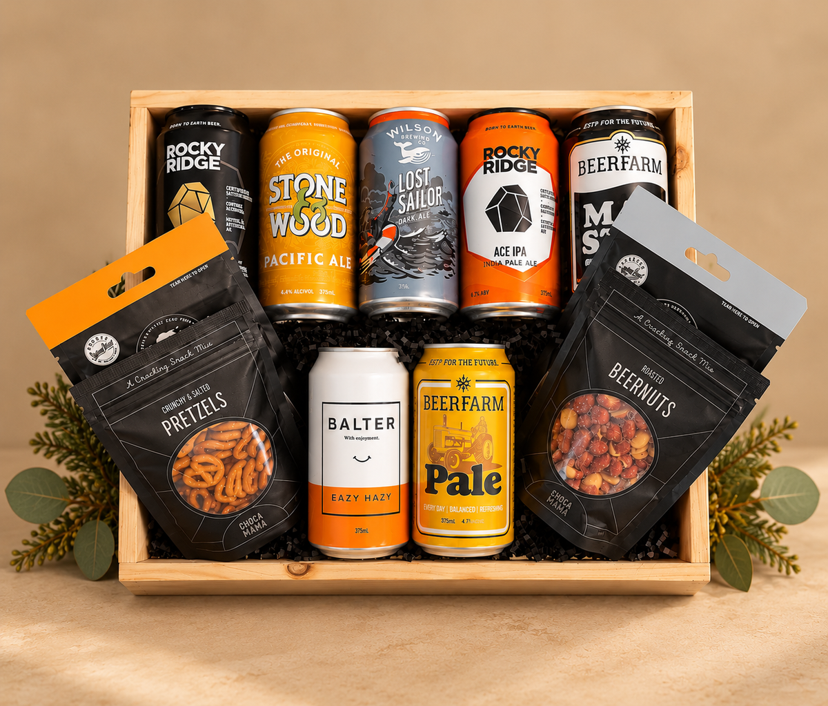 A generous selection of Australian craft beers paired with delicious snacks, making this the perfect gift for beer lovers and entertainers alike. Featuring a variety of craft beer styles from Rocky Ridge, Stone & Wood, Wilson Brewing Co., Beerfarm and Balter, alongside crunchy pretzels and roasted beernuts from Choca Mama.
Presented in a stylish timber gift box, this is a relaxed yet impressive gift that’s perfect for celebrating, corporate gifting or simply enjoying a selection of great local beers.