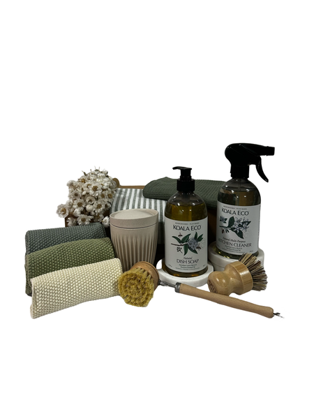 Cleaning products. knit cloths , coffee cup and two wooden brushes